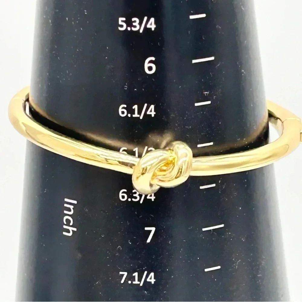 Kate Spade Sailor’s Knot Gold Hinged Bangle